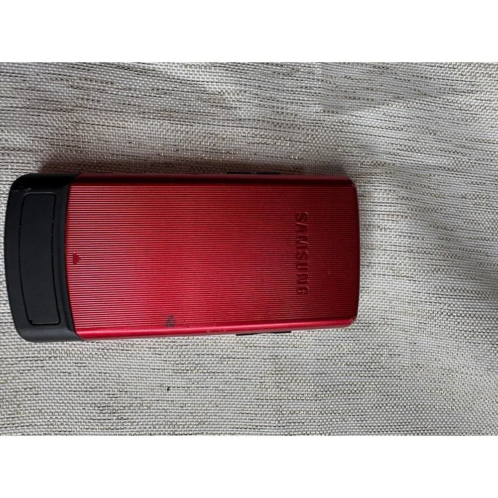 red Samsung SGH-A777, a 3G slider phone